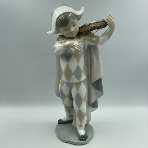 Lladro young boy playing - boy,